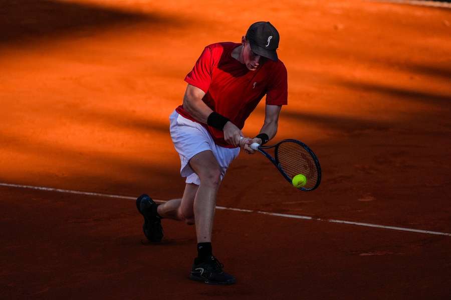 Elmer Moller in action against Andrej Martin Elmer Moller in action against Andrej Martin