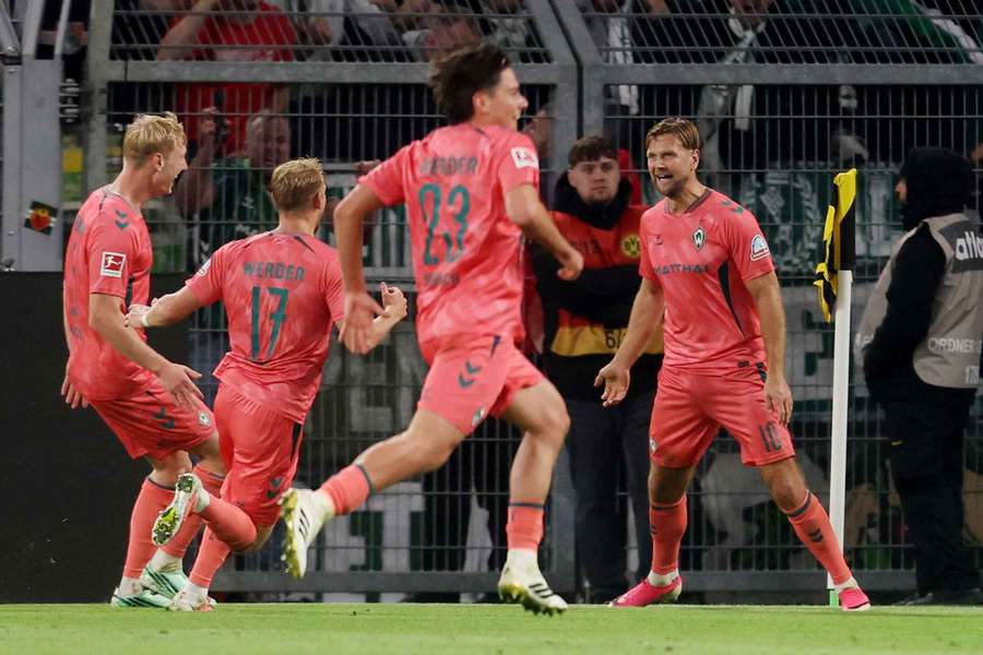Werder Bremen's Niclas Fullkrug celebrates scoring their second goal with teammates Werder Bremen's Niclas Fullkrug celebrates scoring their second goal with teammates