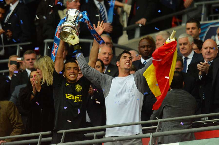Joel Robles celebrates winning the FA Cup with Wigan Joel Robles celebrates winning the FA Cup with Wigan