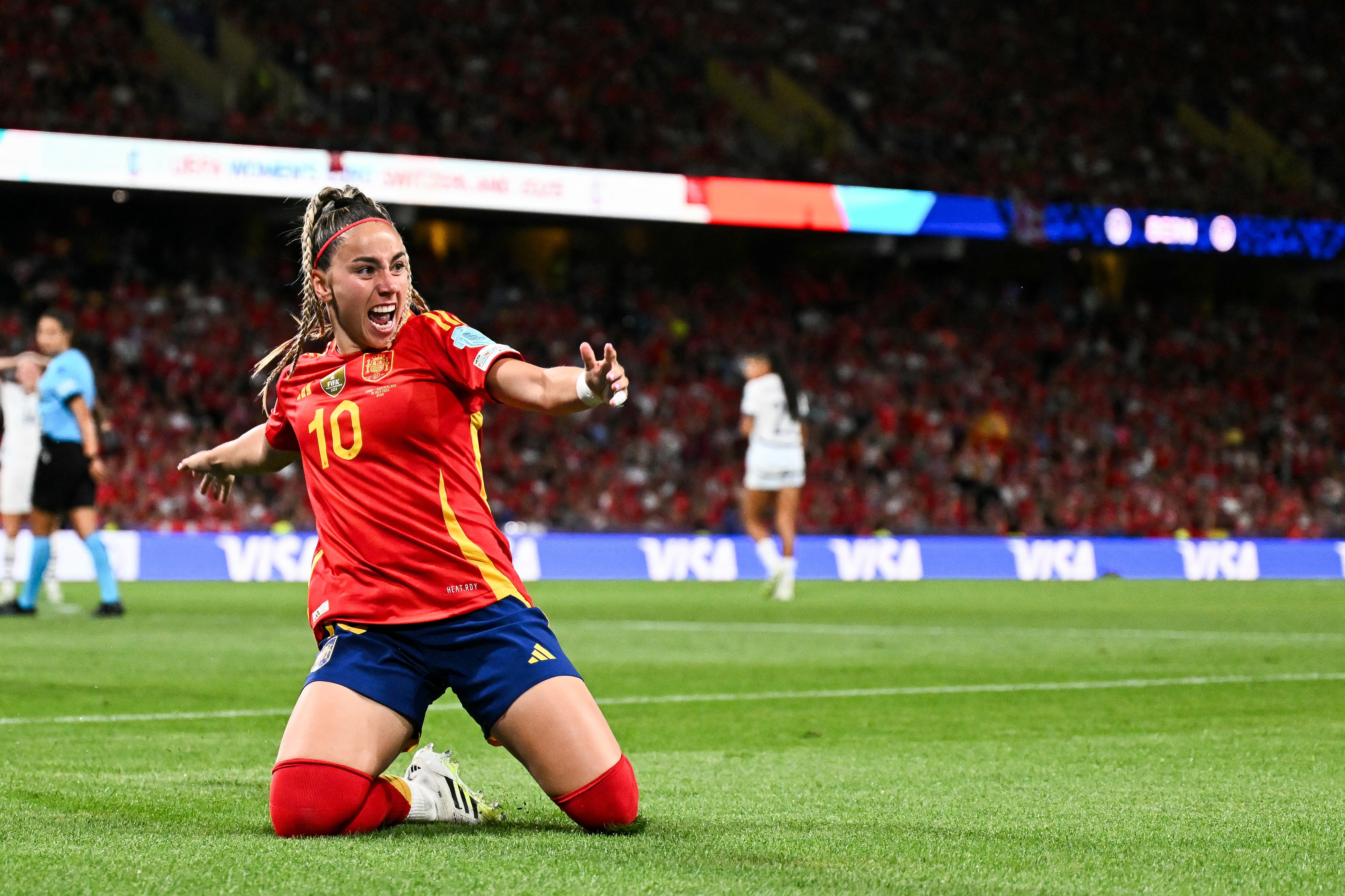 Spain advances to the semi-finals after a second-half surge against the hosts Switzerland.