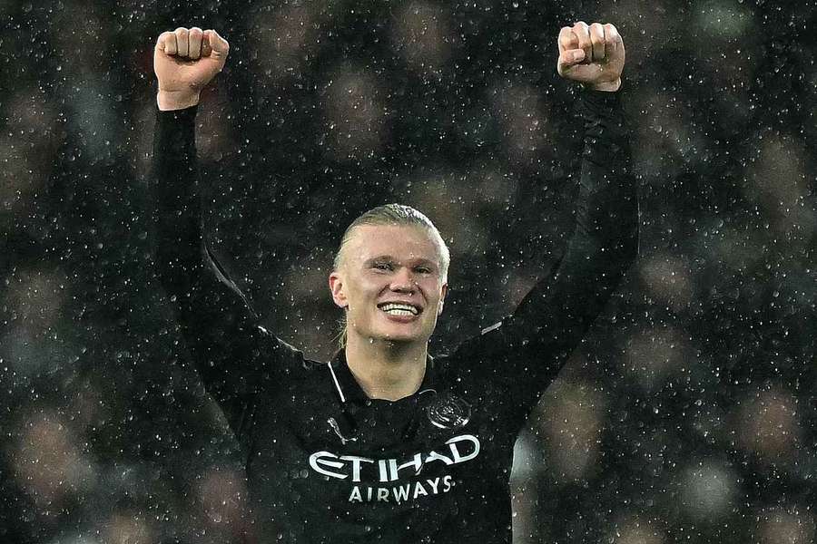 Manchester City's Norwegian striker #09 Erling Haaland (2L) celebrates scoring the opening goal, and his 100th Premier League goal
