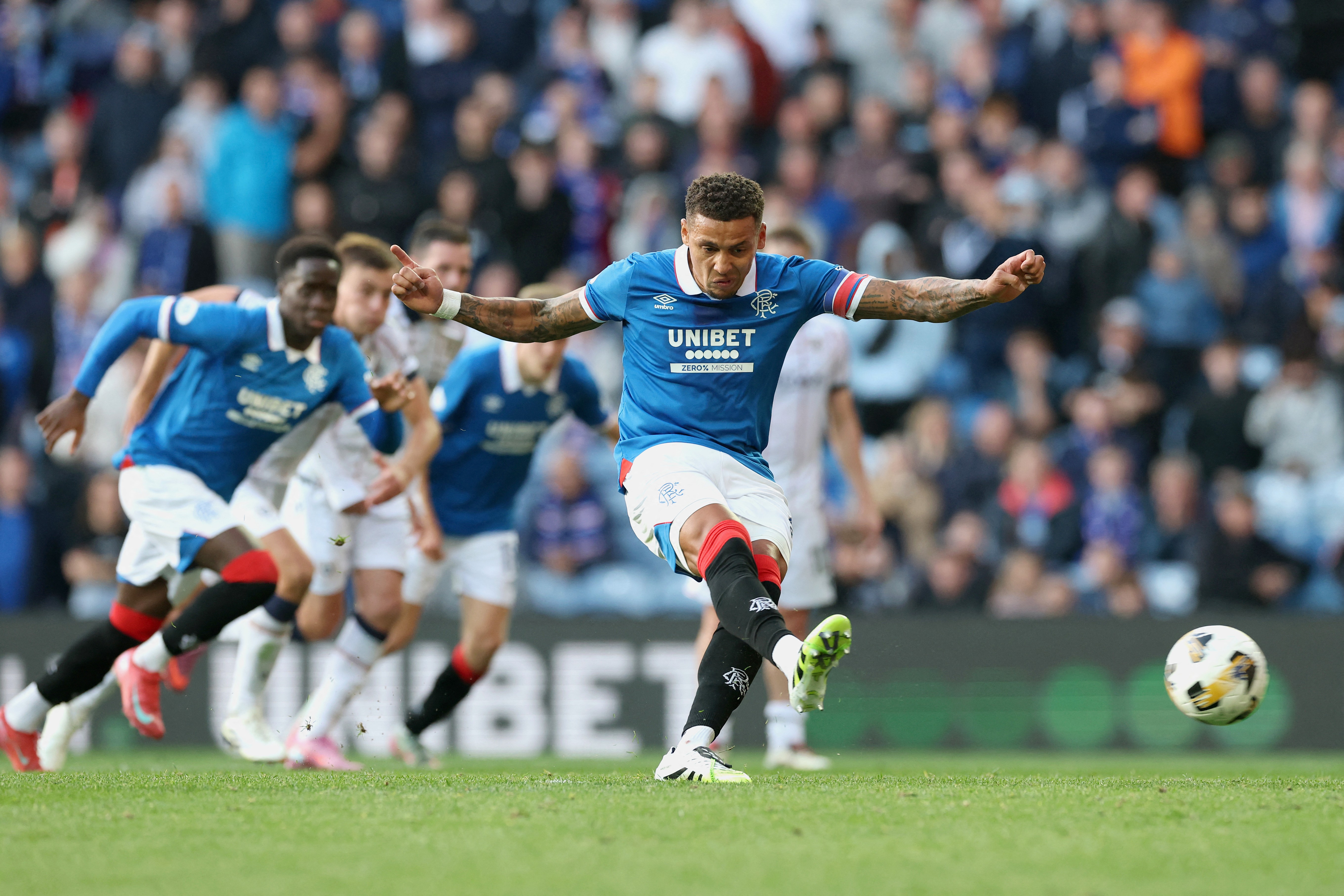 Scottish Premiership: 10-man Rangers manage to secure a home draw against Dundee with a late penalty.