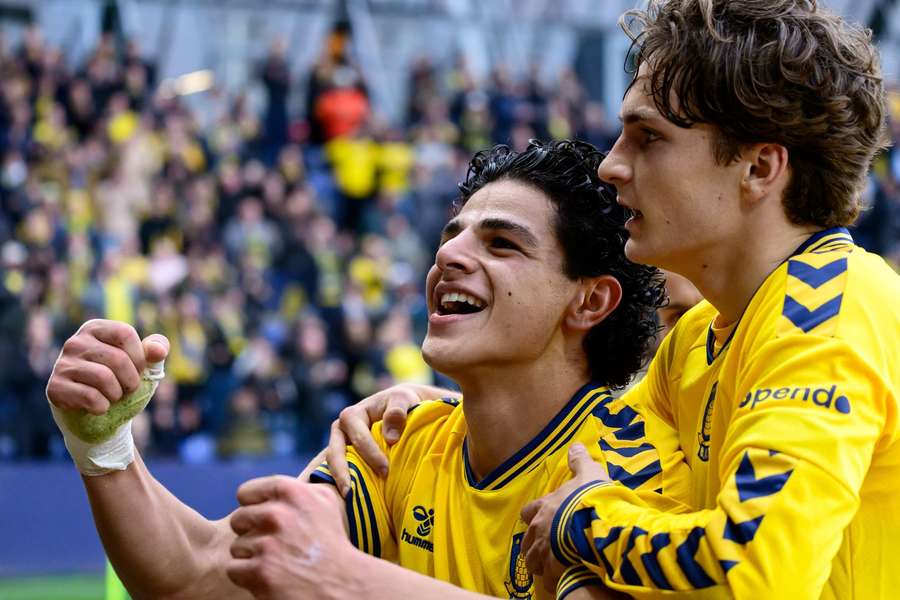 Brondby players celebrate their win Randers