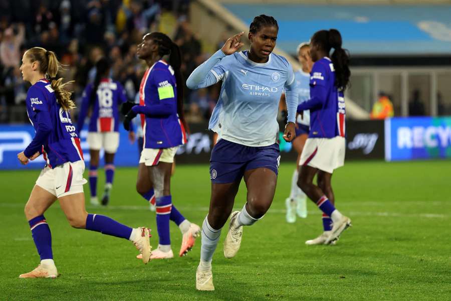 Khadija Shaw celebrates after opening the scoring for Manchester city