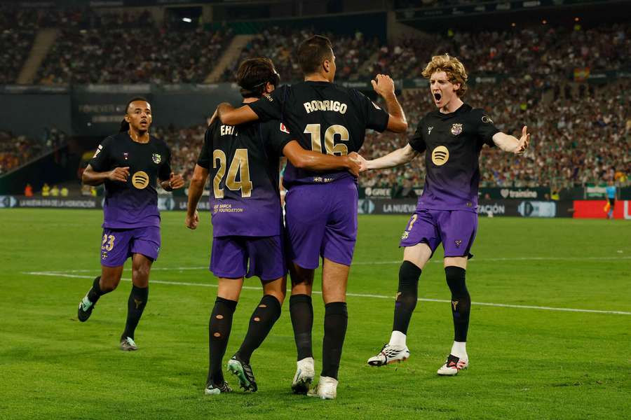Barcelona's Eric Garcia celebrates scoring his fourth goal with Rodri and Anthony Gordon Barcelona's Eric Garcia celebrates scoring his fourth goal with Rodri and Anthony Gordon
