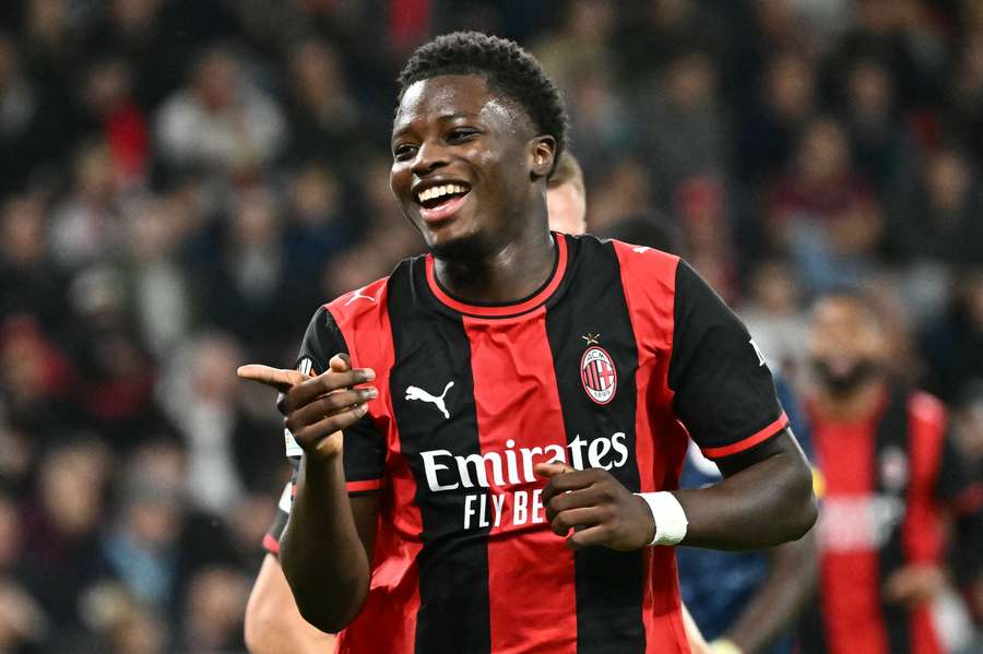 AC Milan's Alphadjo Cisse celebrates scoring his team's second goal AC Milan's Alphadjo Cisse celebrates scoring his team's second goal