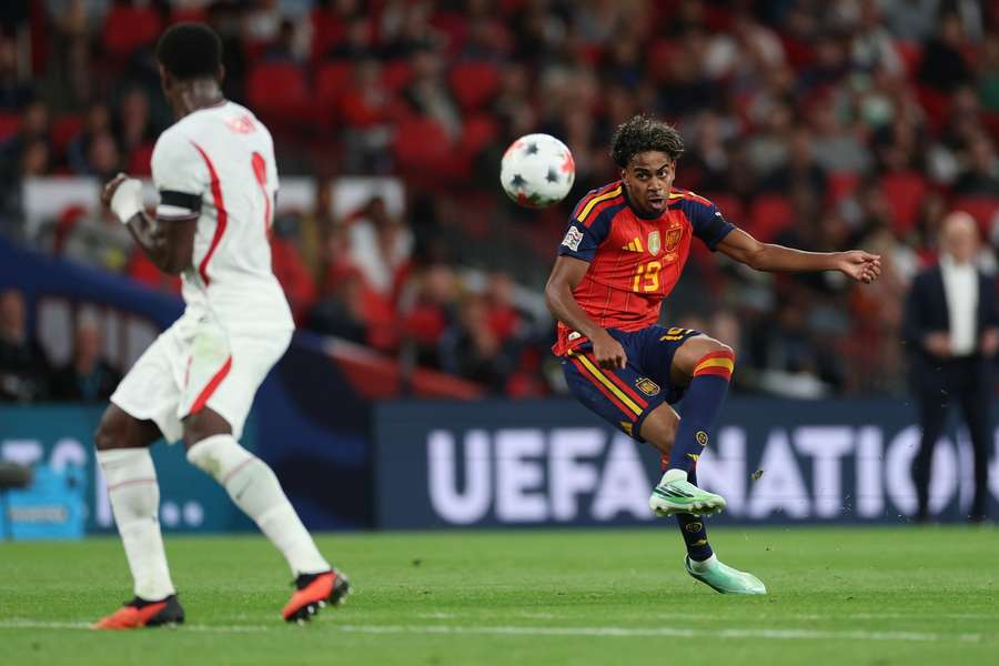 Spain's Lamine Yamal takes a shot against England