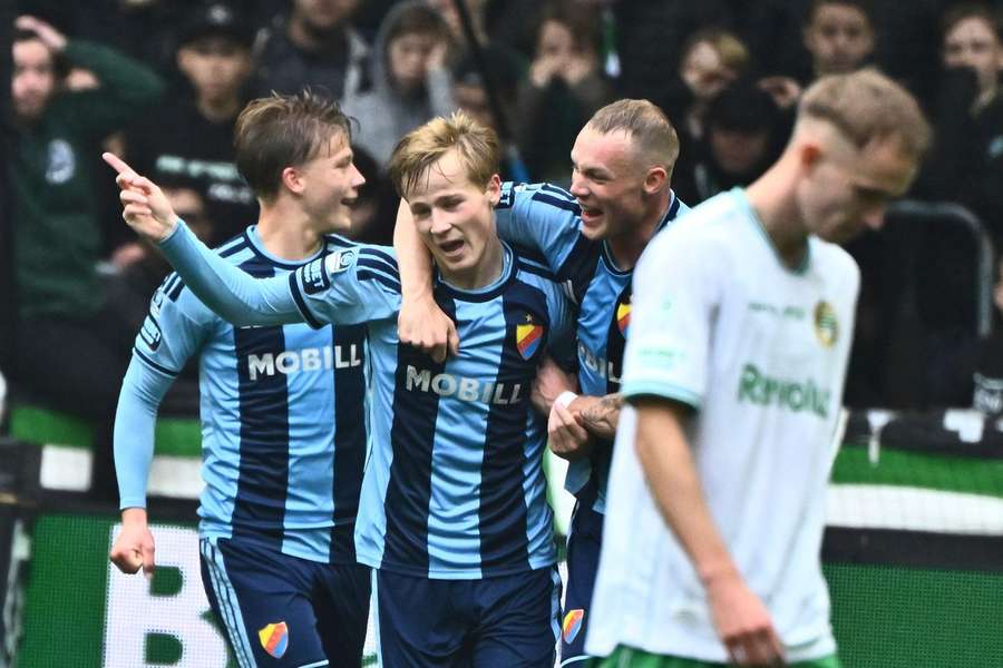 Bo Hegland (second left) celebrates his winning goal for Djurgarden