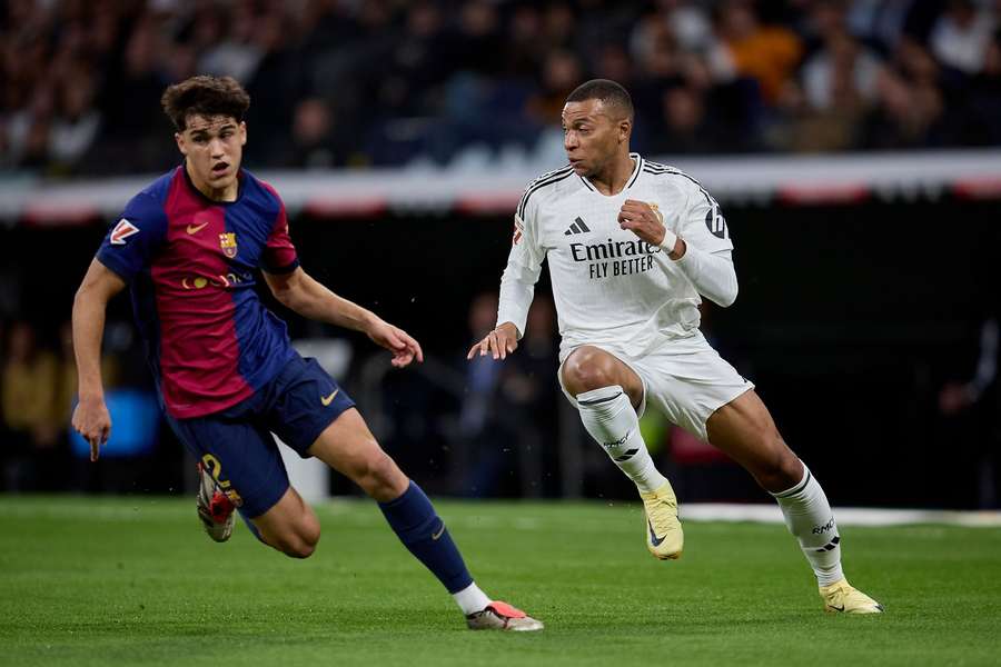 Real Madrid's Kylian Mbappe and Barcelona's Pau Cubarsi during a previous El Clasico Real Madrid's Kylian Mbappe and Barcelona's Pau Cubarsi during a previous El Clasico