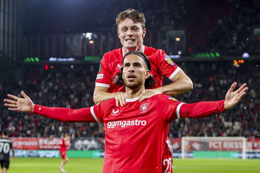 FC Twente's Ramiz Zerrouki celebrates scoring against Thun with Sondre Orjasaeter FC Twente's Ramiz Zerrouki celebrates scoring against Thun with Sondre Orjasaeter
