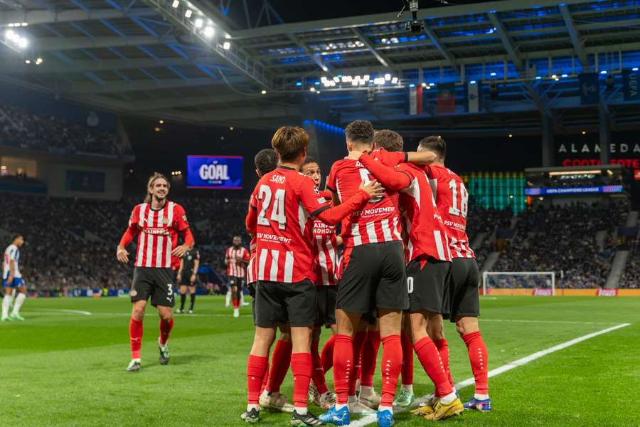 PSV celebrate Guus Til's goal against Porto PSV celebrate Guus Til's goal against Porto
