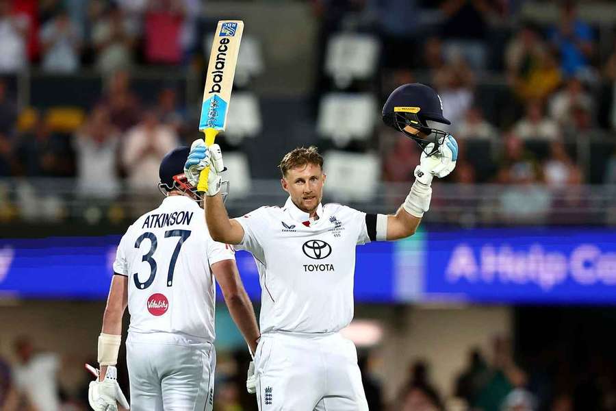 Joe Root celebrates his century