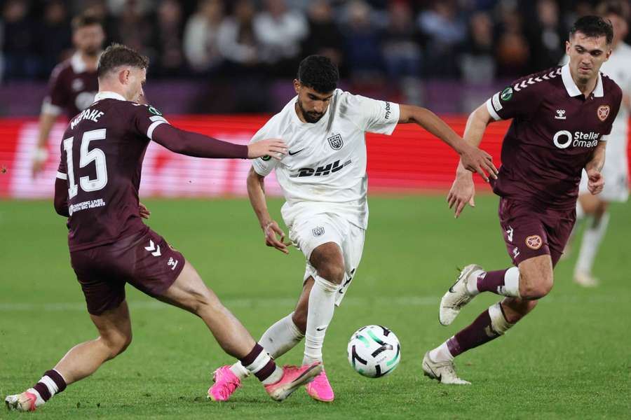Heart of Midlothian's Josh McPake in action with Nordsjaelland's Ibrahim Adel Heart of Midlothian's Josh McPake in action with Nordsjaelland's Ibrahim Adel