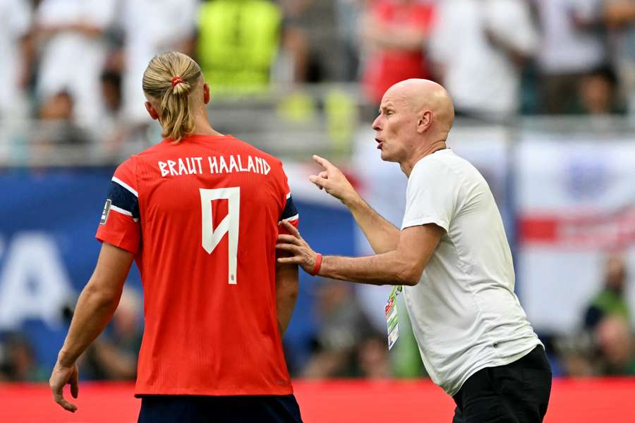 Stale Solbakken give instructions to striker Erling Haaland during the World Cup Stale Solbakken give instructions to striker Erling Haaland during the World Cup