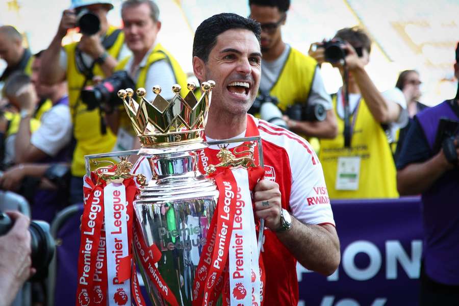 Mikel Arteta with the Premier League trophy last season Mikel Arteta with the Premier League trophy last season