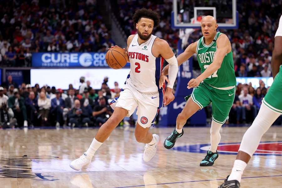 Pistons' Cade Cunningham handles the ball against the Boston Celtics during the 2026-27 NBA season opener Pistons' Cade Cunningham handles the ball against the Boston Celtics during the 2026-27 NBA season opener