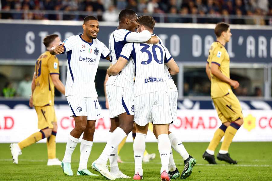 Inter player Carlos Augusto celebrates their second goal with his teammates Inter player Carlos Augusto celebrates their second goal with his teammates