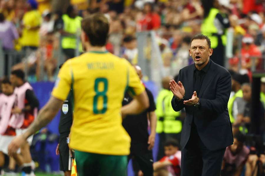 Tony Popovic applauding his players during the recent FIFA World Cup. Tony Popovic applauding his players during the recent FIFA World Cup.