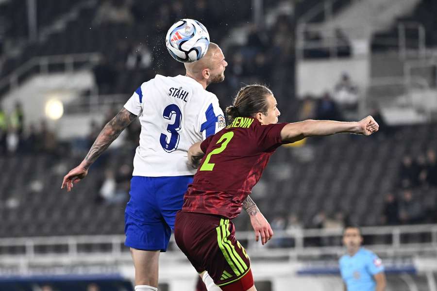 Adam Stahl of Finland wins a header against Kirill Pechenin of Belarus Adam Stahl of Finland wins a header against Kirill Pechenin of Belarus