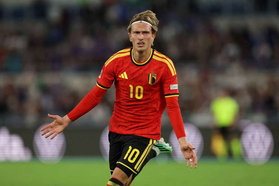 Belgium's Godts celebrates after scoring against Italy